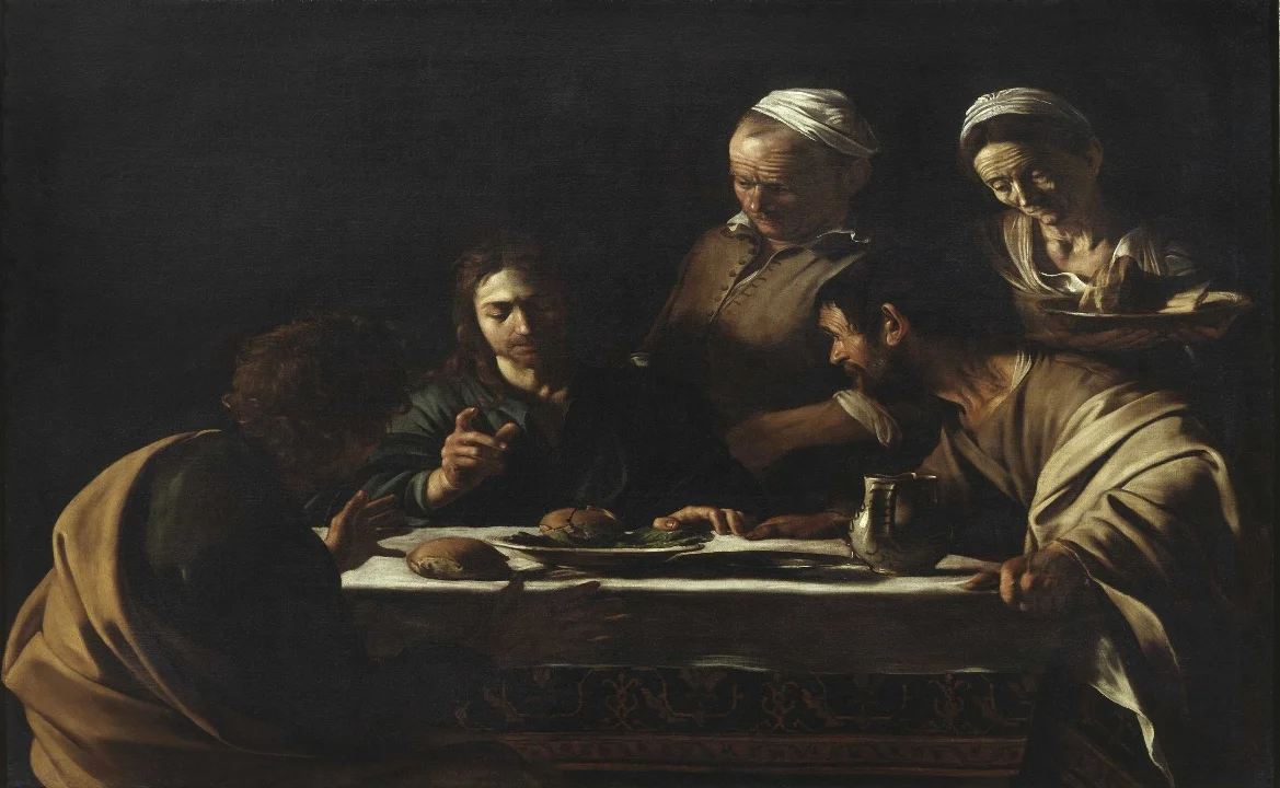 Caravaggio painted Jesus during a dinner in Emmaus, in an intimacy context given by the use of the shadows