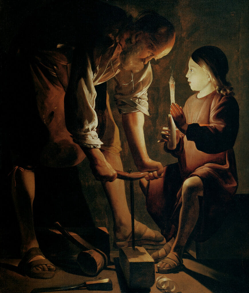 Painting of an old man (Saint Joseph) and child holding a candle
