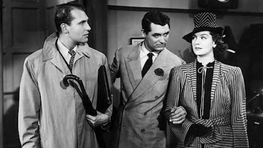 One of the first scenes of His Girl Friday by Hawkes, starring Cary Grant, Rosalind Russel and Ralph Bellamy