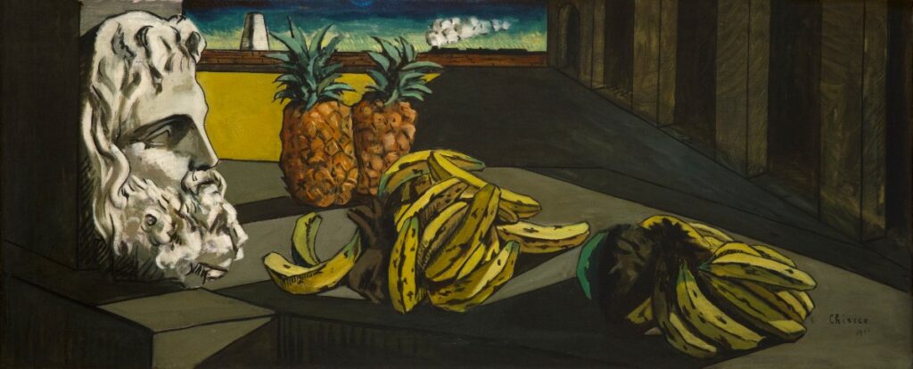 Giorgio de Chirico juxtaposes unusual objects within a vast, empty Italian piazza. An arrangement of fruit and a statue of the ancient Roman god Jupiter’s head in the foreground are offset in the distance by a steam train. In the years before World War I (1914–1918), De Chirico was an originator of the Italian movement, Pittura Metafisica (Metaphysical Painting), which sought to explore alternative realities behind appearances. The dreamlike qualities of the artist’s work were a major inspiration for the Surrealists.
